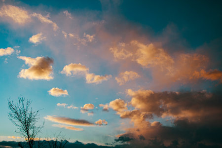 warm clouds in the sky at sunset