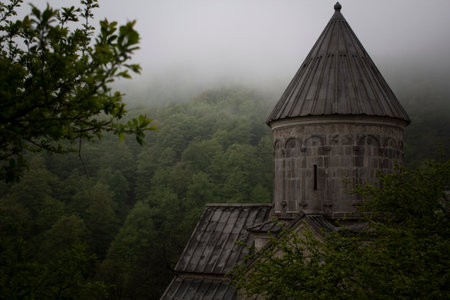 church in the forest during fogの写真素材