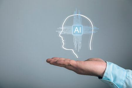 Artificial intelligence in the motherboard in the head silhouette. Man holding in his handの写真素材