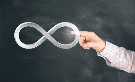 Infinity sign from the web. Man tapping on the screenの写真素材