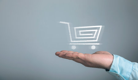 Trolley from the network on the screen. Man holding in his hand