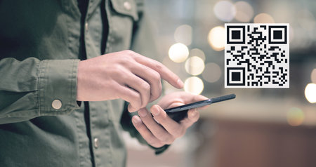Scan QR code icon. Digital scanning qr code. man tapping on phone screenの写真素材