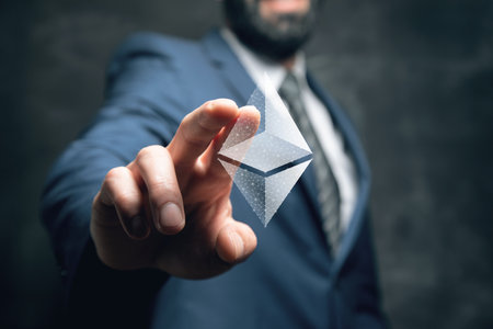 Cryptocurrency icon from web. Man tapping on the screenの写真素材