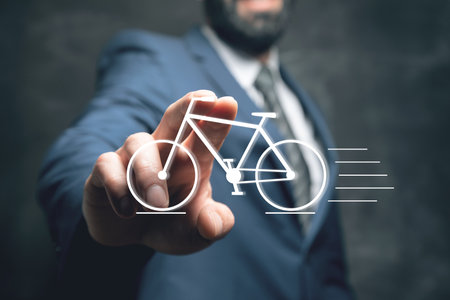 bicycle icon. man tapping on the screenの写真素材