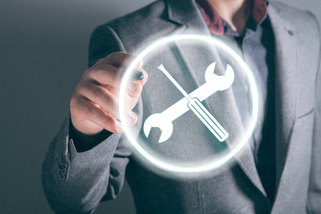 tools icon. wrench and screwdriver. man clicks on the screen. tech support concept