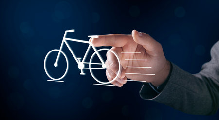 bicycle icon. man tapping on the screenの写真素材