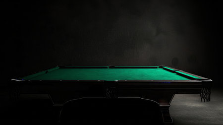 vertical shot of a pool table in a dark roomの素材