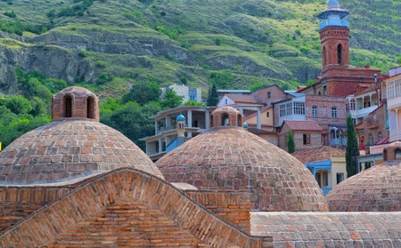 Brick roofs, sulfur baths in Tbilisi, under sunlight. TBILISI, GEORGIA Historical Old Sulfur Baths in old Tbilisiのeditorial素材