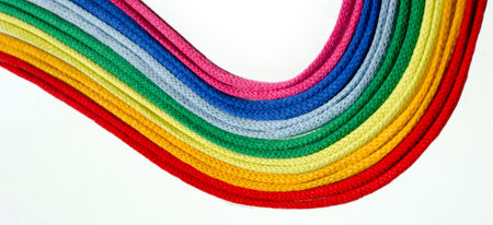 Turkish yarn. Bright rainbow palette of multi-colored, cotton for macrame on an isolated white...