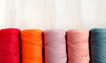 ECO fibers, colored skeins of thread for weaving macrame close-up. Cotton threads made in Turkey.