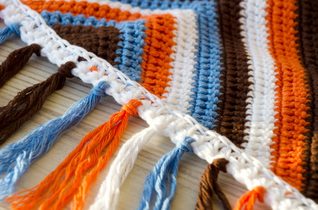 Texture knitted from cotton thread. Handmade concept, hobby, background, fashionable online knitting...