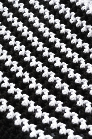 Cotton yarn. Cotton cord pattern in black and white. A fragment of a women's handbag made from ECO yarn.の写真素材