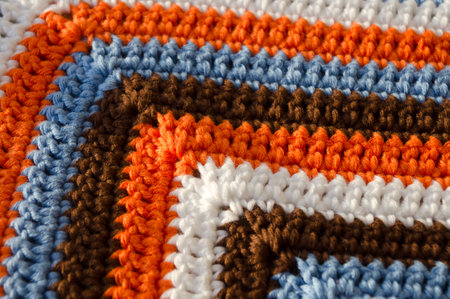 Crochet close-up. Handmade knitted jewelry made from cotton yarn.