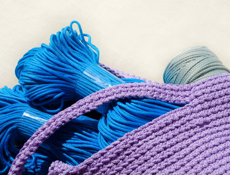Crochet pattern using polyester cord. Bright blue cord for knitting bags, baskets and string bags.