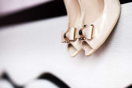 A detail of beige woman's shoesの写真素材