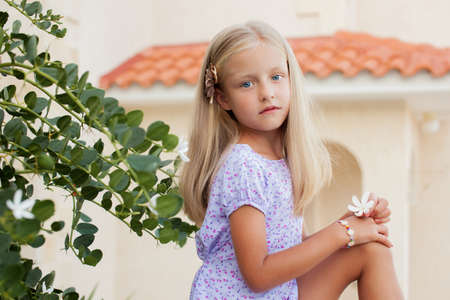 Portrait of a beautiful pretty girl in summer outdoorの写真素材