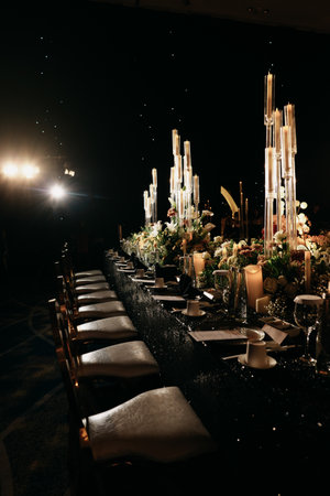 luxury wedding dining table decoration with white roses and dim light 1