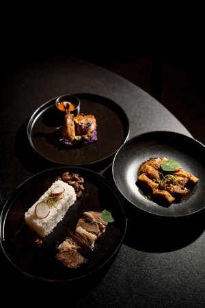 grilled fish dish with spiced chicken and rice on a plate on the dining table (3)の写真素材