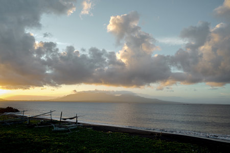 Beautiful view of sunrise on the beach with cloudy sky, landscapeの写真素材