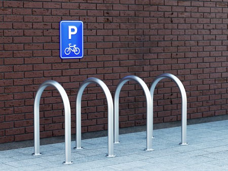 Empty outdoor bike parking with bicycle sign on brick wall. 3D illustrationの写真素材