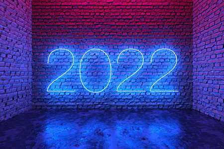 Blue neon text 2022 on brick wall background. New year concept. 3D illustrationの写真素材