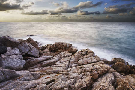 Seacoast at dusk. Long exposure shot.の写真素材
