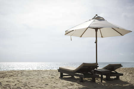 Beach chairs. Very shallow depth of field.の写真素材