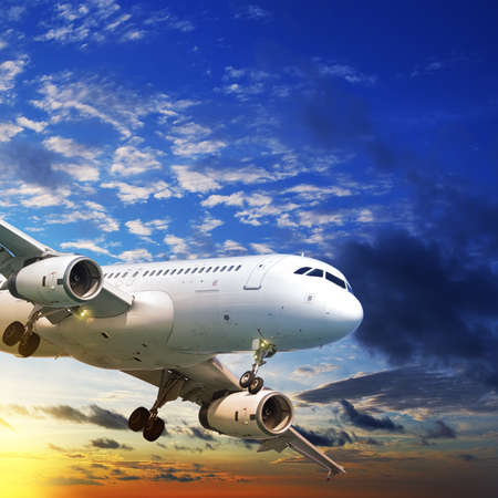 Jet plane in a sunset sky. Square composition.