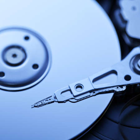 Hard disk, square composition. Shallow depth of field.