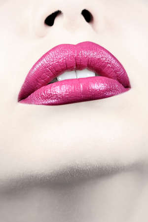 Sensual female lips closeup. Vertical shot.