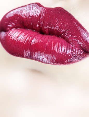 Sensual female lips macro. Vertical shot.の写真素材