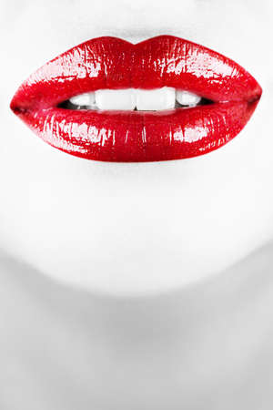 Smiling female lips. Vertical shot.の写真素材
