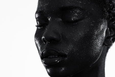 Girl in studio shoot, on white background, model, emotions, amazing, oil water wetの写真素材