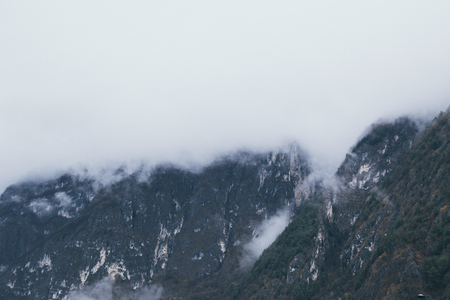 Mountain. Top view in the snow with fog, Italian Alpsの写真素材