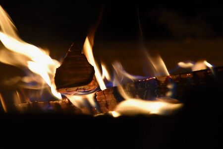 Burning bonfire in the snow in winter. Fire.