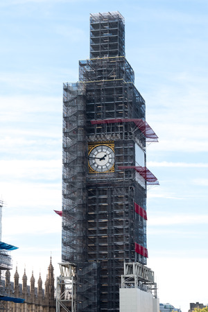 London, United Kingdom - October 13 2018: Elizabeth Tower (former Clock Tower) with famous big ben under reconstruction in 2018.のeditorial素材