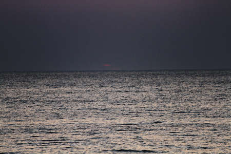 sunset time in Livorno beach , Italyの写真素材