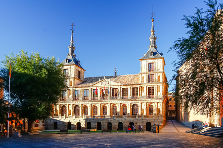 TOLEDO, SPAIN - OCTOBER 14 2012: Morning ight at Plaza del Ayuntamiento in front of the Cathedral of Saint Mary in Toledo, Spainのeditorial素材