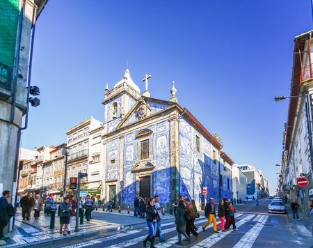 PORTO,PORTUGAL - OCTOBER 20,2012 : Traditional historic facade in Porto decorated with blue hand painted tin-glazed tiles, Oporto, Portugalのeditorial素材