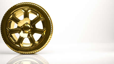 golden 3d rendering of a wheel inside a studioの写真素材