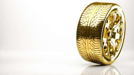 golden 3d rendering of a wheel inside a studioの写真素材