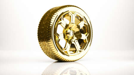 golden 3d rendering of a wheel inside a studioの写真素材