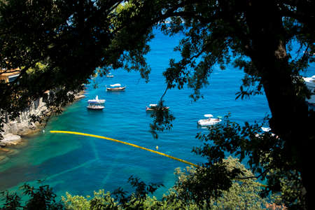 vacation time in Summer with blue water and clear skyの写真素材