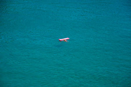 vacation time in Summer with blue water and clear skyの写真素材