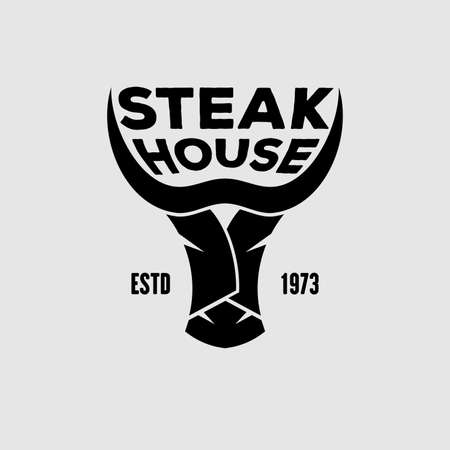 Steakhouse logo design with bull head. Vectorのイラスト素材