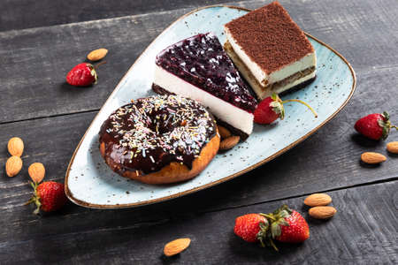 Beautiful doughnut, chocolate cake, tiramisu, top viewの写真素材