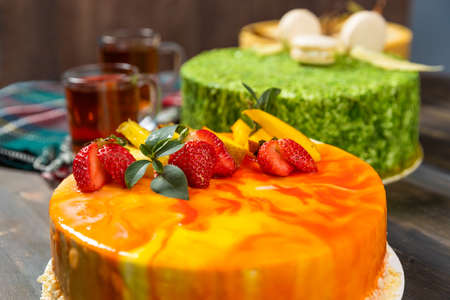 Beautiful strawberry cake on the wooden tableの写真素材