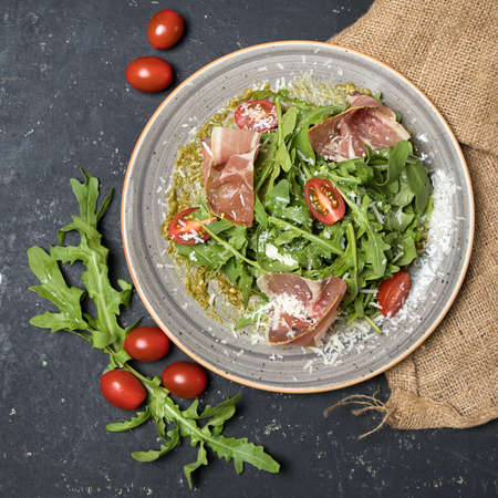 Raw beef meat meal with herbs salad top viewの写真素材