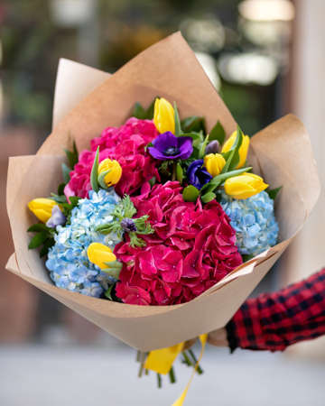 Beautiful colorful flower bouquet with blur backgroundの写真素材