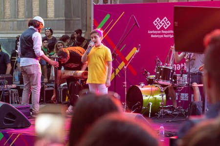 Young boy performing at the concertのeditorial素材